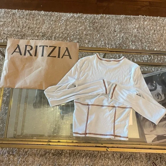 New with tags Aritzia Sunday Best
DOVE LONG SLEEVE - Picture 7 of 9